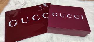 Caja y bolsa Gucci 
