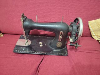 Cabeza de maquina de coser