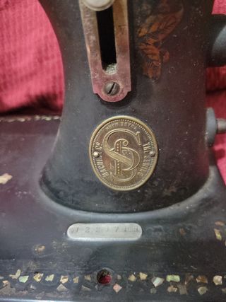 Cabeza de maquina de coser