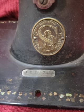 Cabeza de maquina de coser