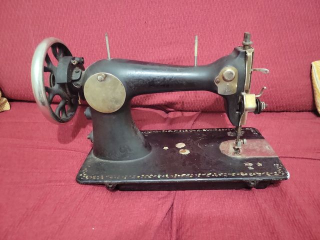 Cabeza de maquina de coser