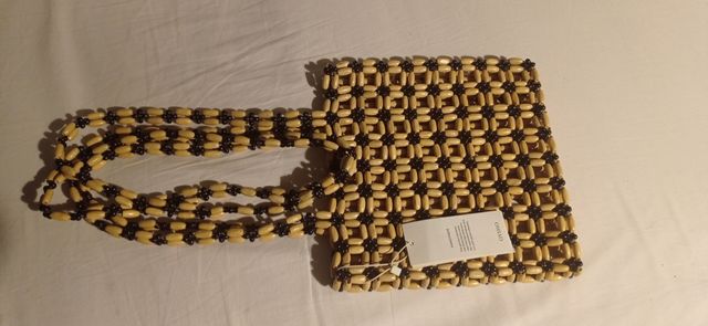 Bolso de abalorios de madera Oysho