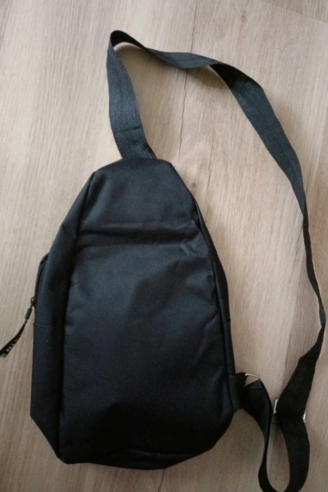 Bandolera Stich. Unisex