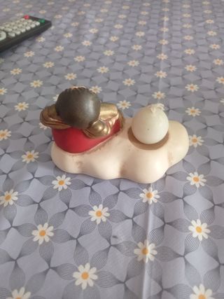 Angelo con pergamena e candela