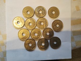 21 monete pesos spagnoli