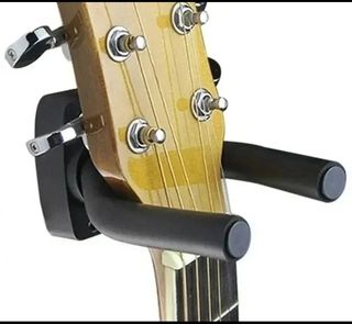 Soporte de pared para guitarra..