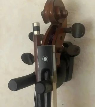 Soporte de pared para guitarra..