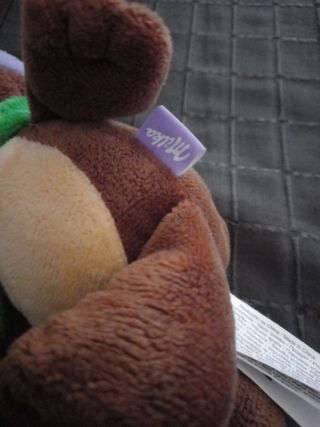 Peluches  orso milka colore marrone lilla