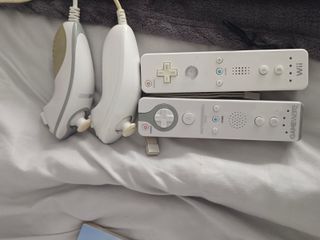 Wii + 8 juegos + mandos+ micrófonos 