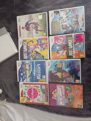 Wii + 8 juegos + mandos+ micrófonos 