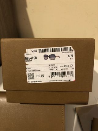 Gafas Burberry negras con patillas dibujo cuadros 