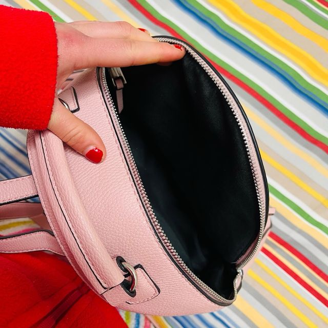 Mochila pequeña rosa de piel