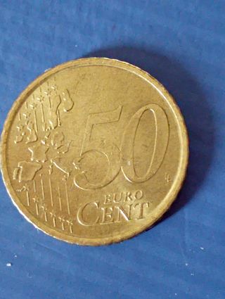 Moneda,M,Cervantes,1999,
50 cms exceso de material