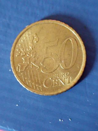 Moneda,M,Cervantes,1999,
50 cms exceso de material