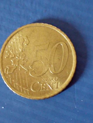 Moneda,M,Cervantes,1999,
50 cms exceso de material