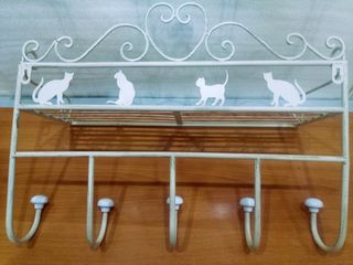 Perchero sombrerero toallero.