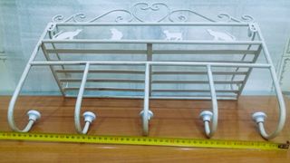 Perchero sombrerero toallero.