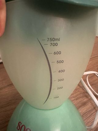 Exprimidor verde agua marca Sogo