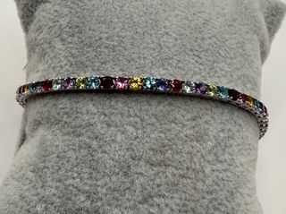 Pulsera riviere de 18 kt con gemas naturales
