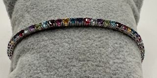 Pulsera riviere de 18 kt con gemas naturales