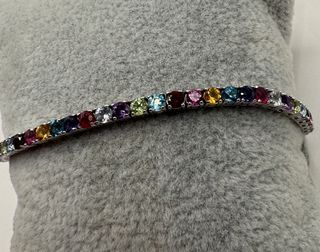 Pulsera riviere de 18 kt con gemas naturales