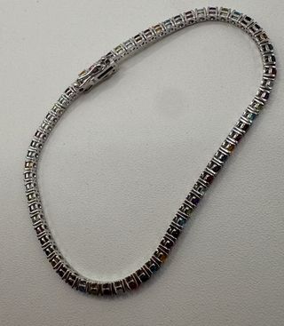 Pulsera riviere de 18 kt con gemas naturales
