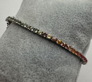 Pulsera riviere de oro de 18 kt con zafiros 