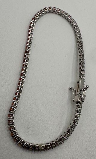 Pulsera riviere de oro de 18 kt con zafiros 