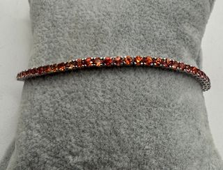 Pulsera riviere de oro de 18 kt con zafiros 