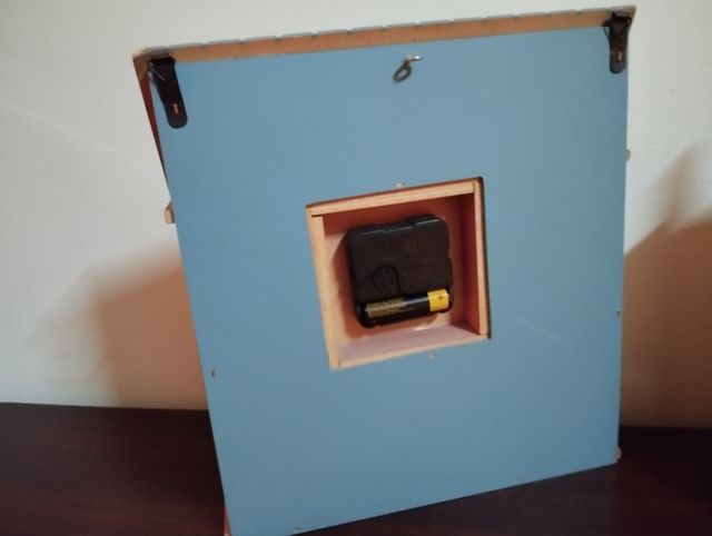 Reloj casita infantil