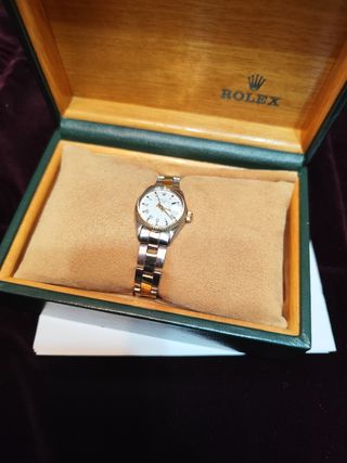 Rolex oyster perpetual date acero y oro