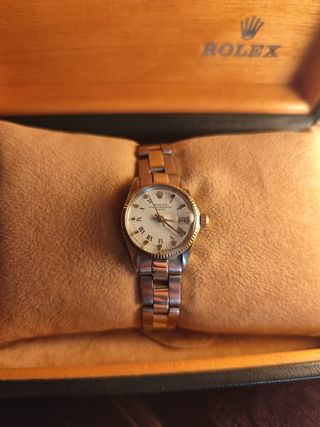 Rolex oyster perpetual date acero y oro