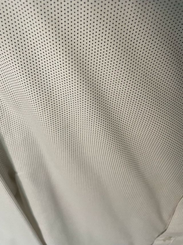 Camisa topos blanca y negro