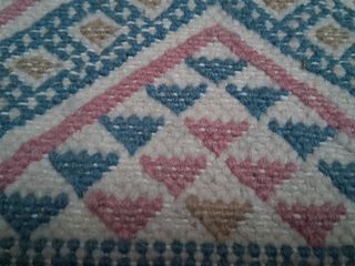 Alfombra artesanal de lana