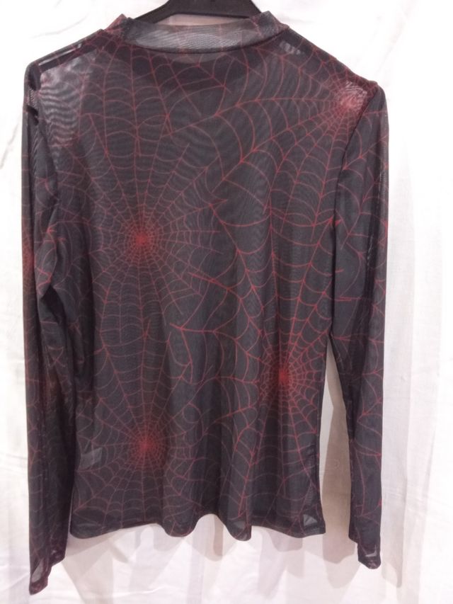 Camiseta cuello alto transparente 