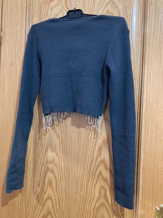 Top corto / jersey con brillos Zara
