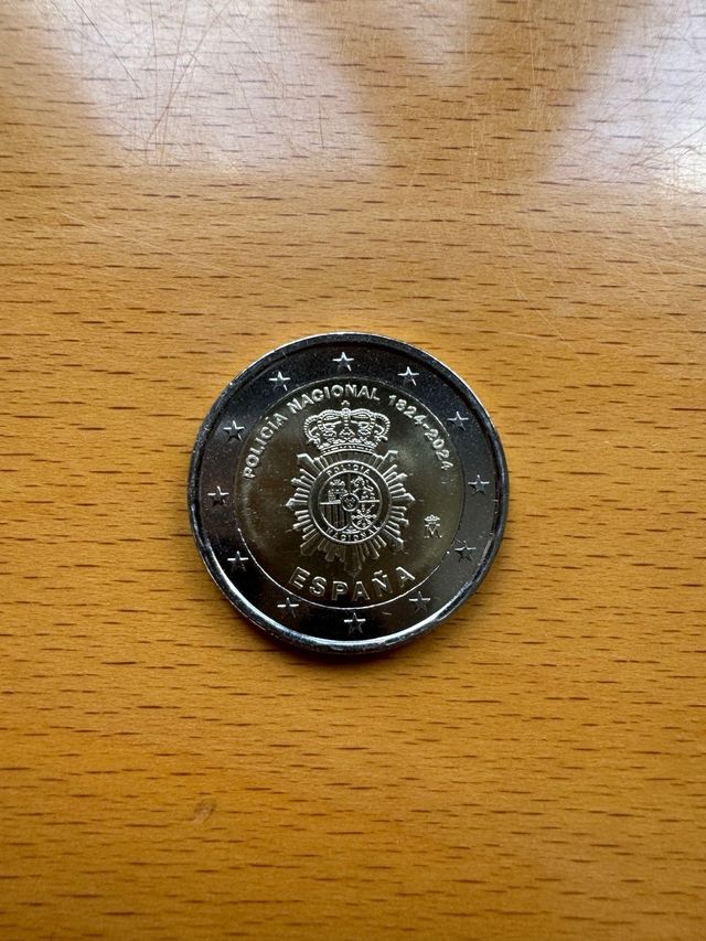 Moneda policia nacional