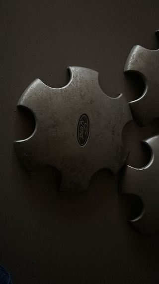 Tapa bujes Ford contour