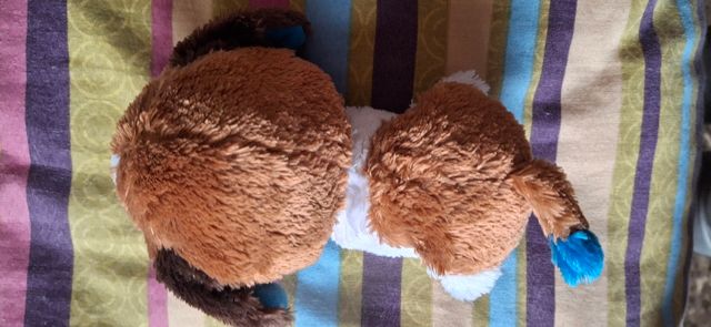 Perrito peluche precioso . No bajo más, gracias.