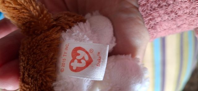 Perrito peluche precioso . No bajo más, gracias.