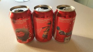 Lattine Coca-cola "The happiness factory" 