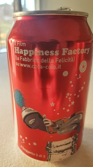 Lattine Coca-cola "The happiness factory" 