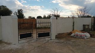 ENFOSCADO Y ENLUCIDO DE FACHADA CON MORTERO CAPA F