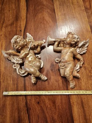Coppia di Putti suonatori