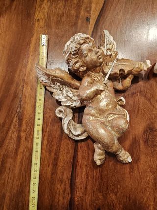 Coppia di Putti suonatori