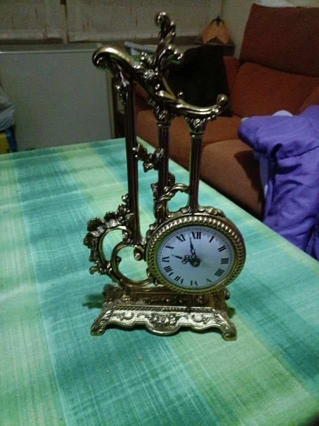 Reloj antiguo de bronce marta Peris