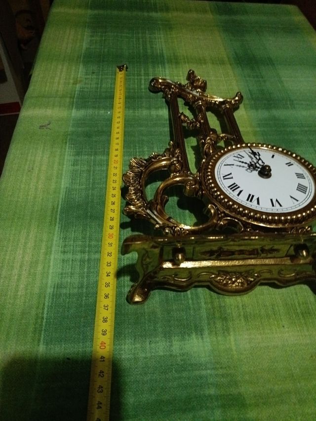 Reloj antiguo de bronce marta Peris