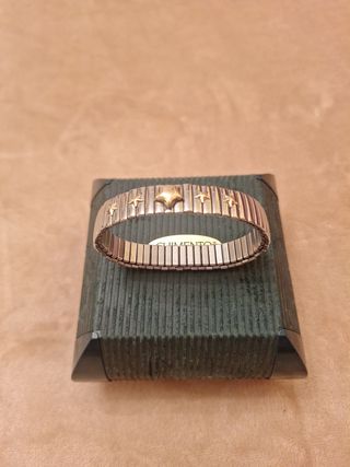 Pulsera elastica acero y oro 18 kl