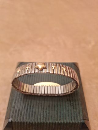 Pulsera elastica acero y oro 18 kl