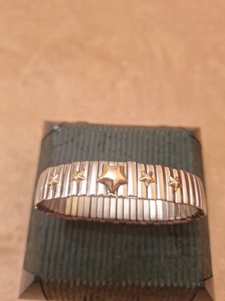 Pulsera elastica acero y oro 18 kl